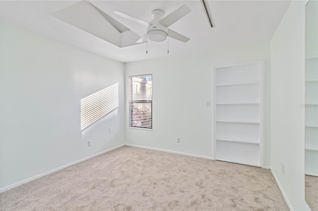 2375 Riverwood Pines Dr, Sarasota, FL 34231 - carpeted empty room with ceiling fan and built in features
