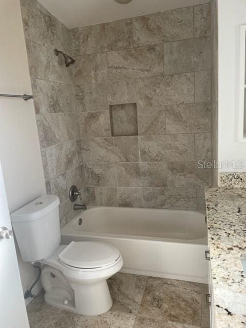 full bathroom featuring shower / bathtub combination, vanity, and toilet