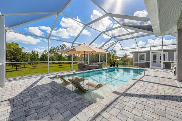 view of swimming pool with a lanai, an outdoor hangout area, and a patio