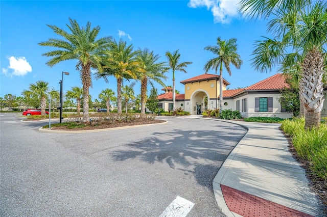 5821 Hevena Ct, Palmetto, FL 34221 - view of asphalt street with street lighting