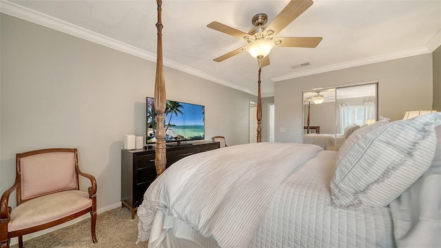 carpeted bedroom with ceiling fan and ornamental molding