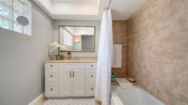 bathroom with vanity and shower / bathtub combination with curtain