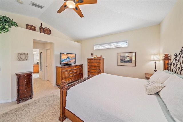 tiled bedroom with vaulted ceiling and ceiling fan