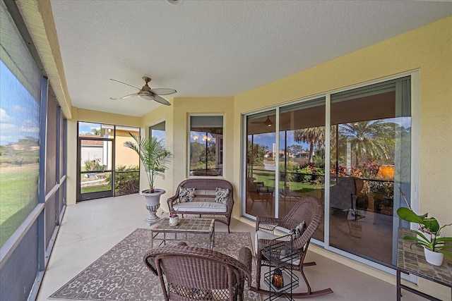 sunroom / solarium with ceiling fan