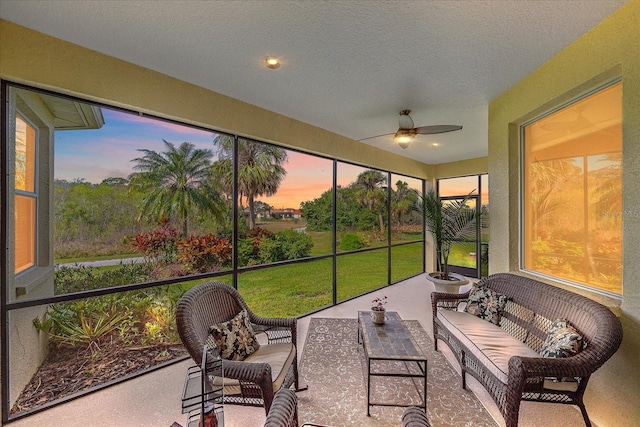 sunroom / solarium with ceiling fan