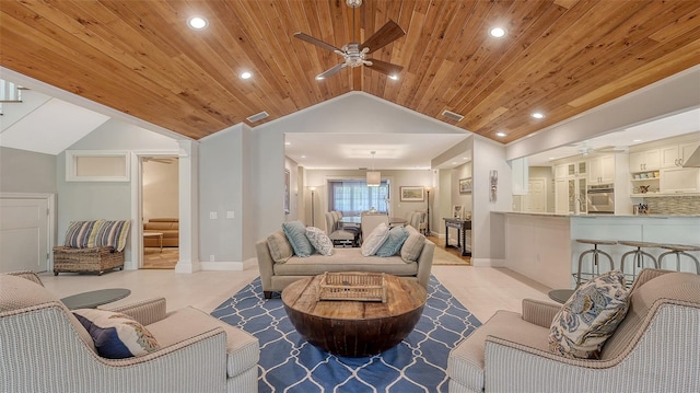 living room featuring lofted ceiling, light tile patterned floors, wooden ceiling, and ceiling fan