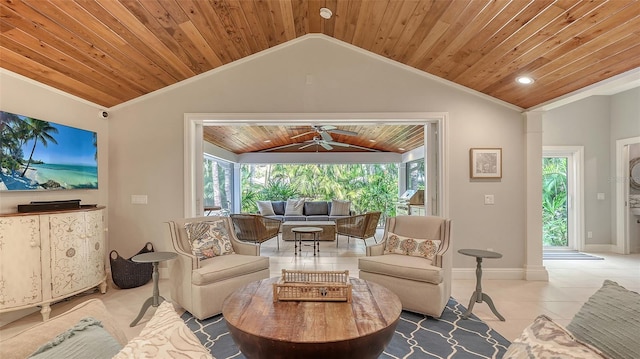 living area featuring a healthy amount of sunlight, tile patterned flooring, vaulted ceiling, and wooden ceiling