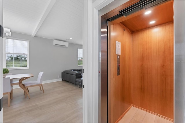 4207 Marina View Way, Cortez, FL 34215 - elevator featuring an AC wall unit, wood finished floors, beam ceiling, and recessed lighting