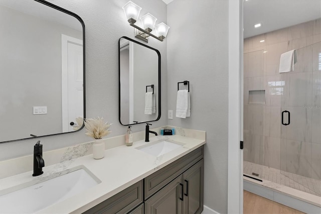 4207 Marina View Way, Cortez, FL 34215 - bathroom featuring a shower stall and double vanity