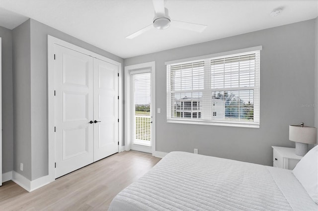 4207 Marina View Way, Cortez, FL 34215 - bedroom featuring wood finished floors, multiple windows, and access to exterior