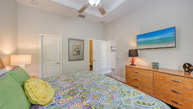 bedroom with lofted ceiling and ceiling fan