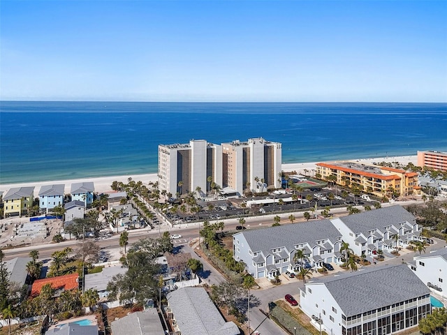 birds eye view of property featuring a water view and a view of the beach