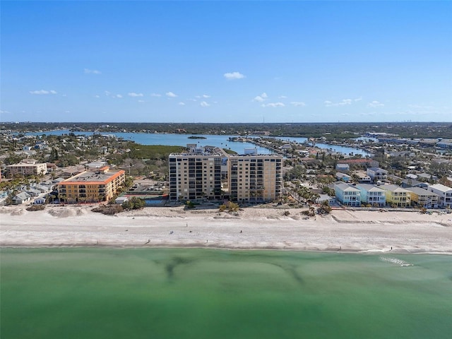 bird's eye view featuring a view of the beach and a water view