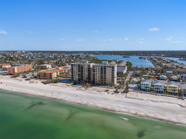 drone / aerial view featuring a beach view and a water view