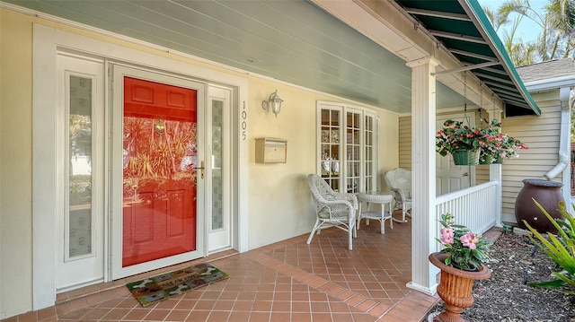 entrance to property with a porch