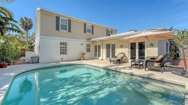 rear view of property with a patio area