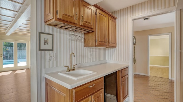 kitchen with sink and light tile patterned floors