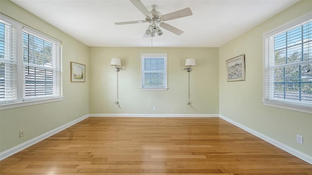 unfurnished room featuring light hardwood / wood-style flooring and ceiling fan