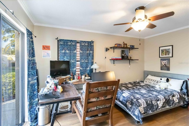 bedroom with crown molding, ceiling fan, and hardwood / wood-style floors