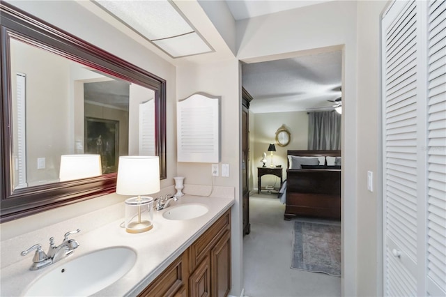 bathroom with vanity and ceiling fan