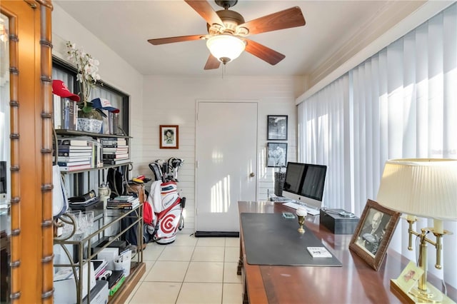 office area with light tile patterned flooring and ceiling fan