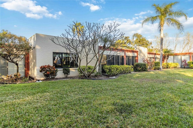 exterior space with a front lawn