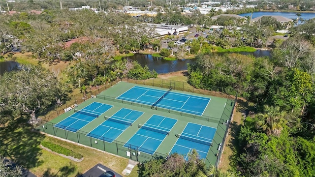 birds eye view of property with a water view