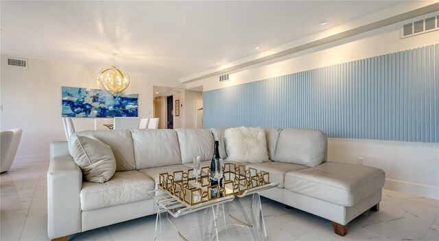 living room featuring an inviting chandelier