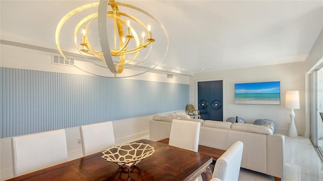 dining area with a notable chandelier