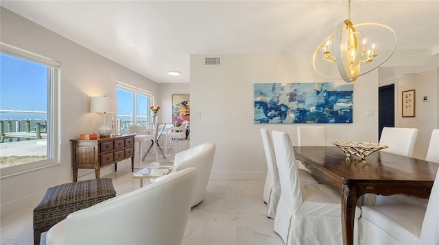 dining room with a chandelier