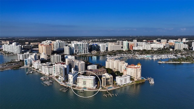 birds eye view of property featuring a water view