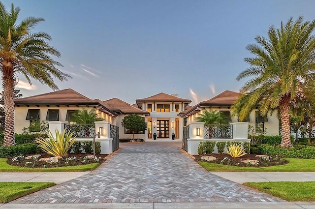 mediterranean / spanish home with french doors