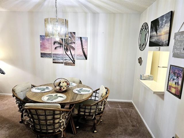 carpeted dining area featuring an inviting chandelier and a textured ceiling