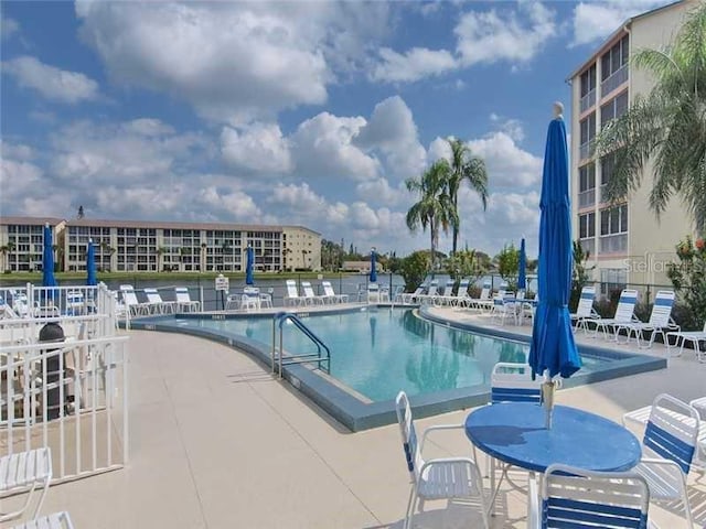 view of swimming pool featuring a patio