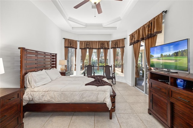 bedroom with ceiling fan, baseboards, access to exterior, a raised ceiling, and crown molding