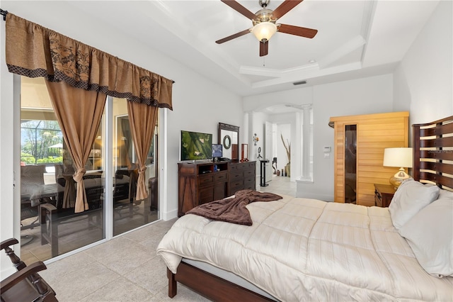 bedroom featuring a raised ceiling, visible vents, ceiling fan, access to outside, and ornate columns