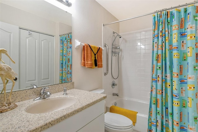 full bathroom featuring shower / bath combination with curtain, vanity, and toilet