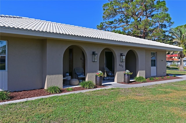 exterior space with a lawn