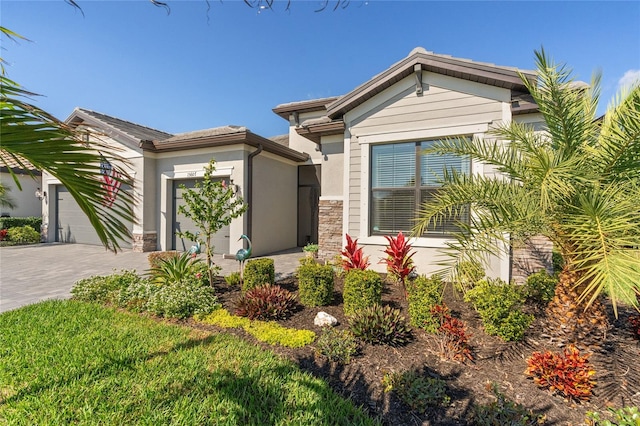 view of front of property with a garage