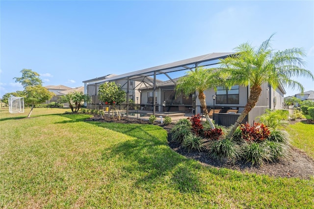 view of yard with a lanai