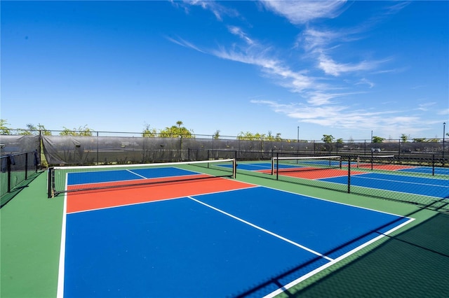 view of sport court featuring basketball hoop