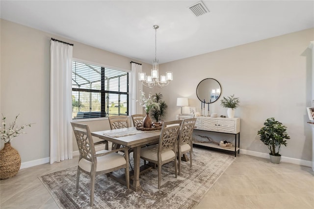 dining room featuring an inviting chandelier