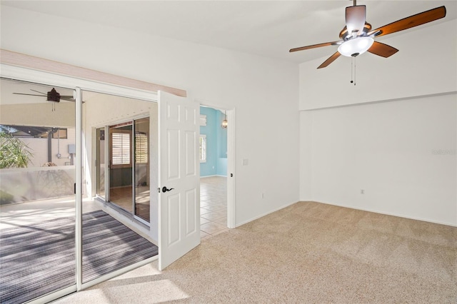 unfurnished room featuring carpet flooring and ceiling fan