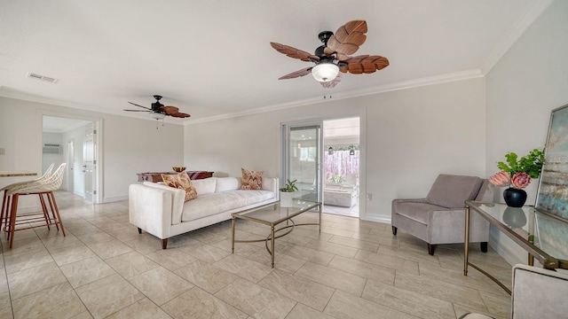 tiled living room featuring ceiling fan and ornamental molding