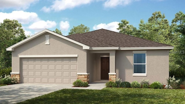 view of front of property with a garage and a front lawn