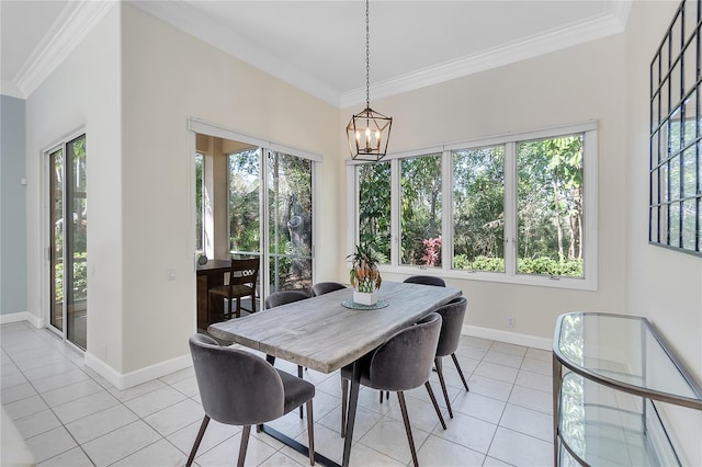 dining room featuring crown molding, a notable chandelier, and light tile patterned floors