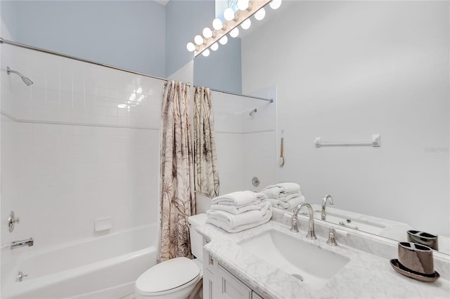 full bathroom featuring vanity, shower / bathtub combination with curtain, and toilet