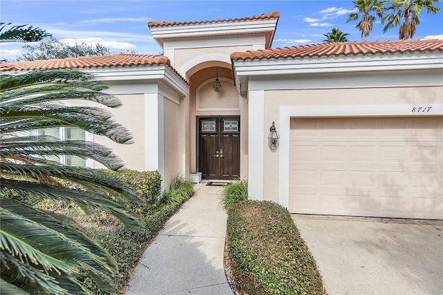 property entrance with a garage