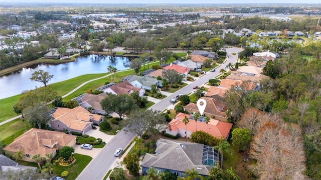 drone / aerial view with a water view