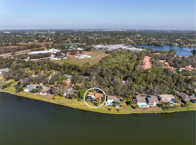 birds eye view of property featuring a water view